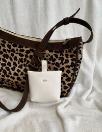 CHARM MONEDERO BEIGE